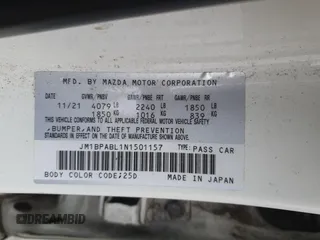 2022 Mazda 3 Select z VIN JM1BPABL1N1501157, wystawiony jako Copart lot #54688555 z przebiegiem 13 076 mil mil oraz Nie do naprawy • Non repairable. Historia ofert i sprzedaży dostępna na DreamBid. Obrazek 12.