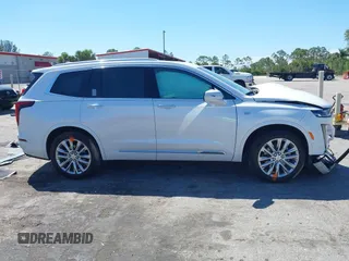 2024 Cadillac XT6 FWD Premium Luxury с VIN 1GYKPCRS0RZ700856, выставлен на аукционе IAAI как лот 41853450 с пробегом 6 507 миль миль и . История ставок и продаж доступна на DreamBid. Изображение 13.