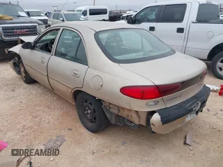 1998 Ford Escort SE z VIN 1FAFP13P7WW206903, wystawiony jako IAAI lot #41430681 z przebiegiem 176 864 mil mil oraz . Historia ofert i sprzedaży dostępna na DreamBid. Obrazek 3.