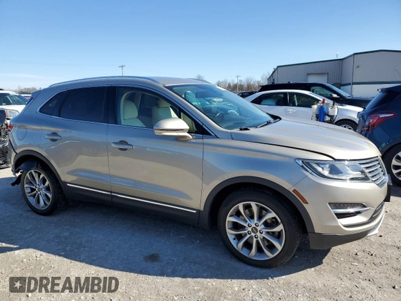 2015 Lincoln MKC with VIN 5LMTJ2AH0FUJ19784, listed as a Copart auction lot 51112455 with 72,123 mi miles and Salvage Title. Bid and sale history available at DreamBid. Image 4.