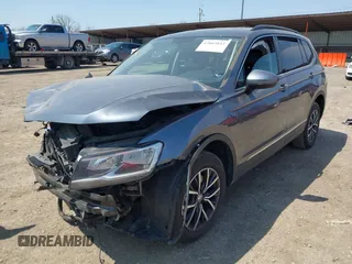 2020 Volkswagen Tiguan SE with VIN 3VV2B7AX4LM074385, listed as a IAAI auction lot 42063842 with 101,092 mi miles and . Bid and sale history available at DreamBid. Image 2.