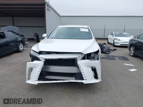 2024 Lexus RX 350 z VIN 2T2BAMBA5RC024585, wystawiony jako IAAI lot #41197857 z przebiegiem 18 031 mil mil oraz . Historia ofert i sprzedaży dostępna na DreamBid. Obrazek 13.