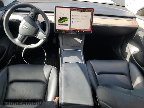 2023 Tesla Model 3 with VIN 5YJ3E1EAXPF708001, listed as a Copart auction lot 57252735 with 71,579 mi miles and Salvage title. Bid and sale history available at DreamBid. Image 8.