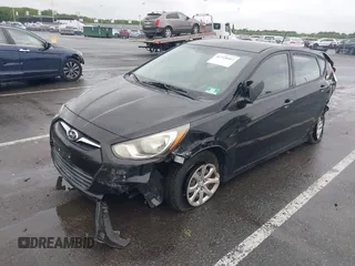 2012 Hyundai Accent GS with VIN KMHCT5AE4CU022894, listed as a IAAI auction lot 42318881 with 179,819 mi miles and . Bid and sale history available at DreamBid. Image 2.