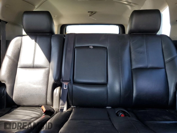 2013 Chevrolet Suburban LT with VIN 1GNSKJE70DR138631, listed as a Copart auction lot 57778185 with 176,934 mi miles and Salvage title. Bid and sale history available at DreamBid. Image 10.