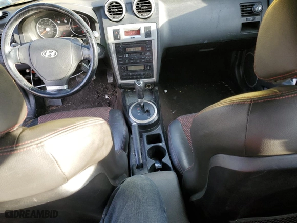 2006 Hyundai Tiburon GT with VIN KMHHN65F96U206869, listed as a Copart auction lot 45211625 with 117,415 mi miles and Salvage Title. Bid and sale history available at carsss.com. Image 8.