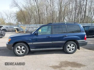 2004 Toyota Land Cruiser with VIN JTEHT05J942054673, listed as a IAAI auction lot 42112791 with 206,784 mi miles. Bid and sale history available at carsss.com. Image 14.
