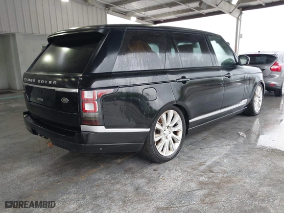 2015 Land Rover Range Rover Supercharged with VIN SALGS3TF4FA214673, listed as a IAAI auction lot 41753240 with 61,450 mi miles. Bid and sale history available at carsss.com. Image 4.