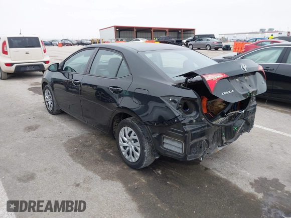2019 Toyota Corolla L with VIN 5YFBURHE5KP945925, listed as a IAAI auction lot 41493079 with 96,849 mi miles and . Bid and sale history available at carsss.com. Image 3.