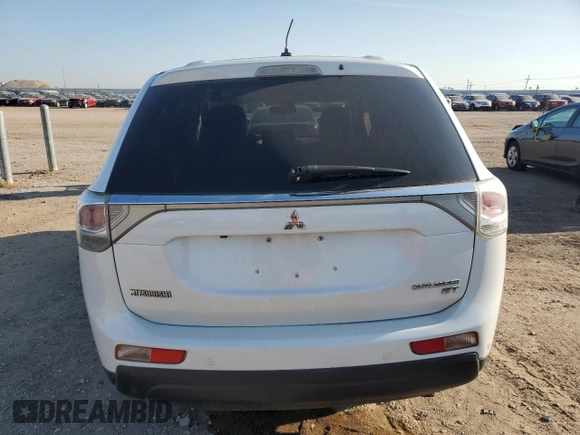 2014 Mitsubishi Outlander GT z VIN JA4JZ4AXXEZ010822, wystawiony jako Copart lot #60328445 z przebiegiem Nie podano mil oraz Szkoda całkowita • Salvage title. Historia ofert i sprzedaży dostępna na DreamBid. Obrazek 6.