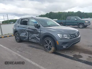 2019 Volkswagen Tiguan SE with VIN 3VV3B7AX5KM124150, listed as a IAAI auction lot 42299786 with 117,687 mi miles and . Bid and sale history available at DreamBid. Image 1.