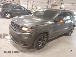 2018 Jeep Grand Cherokee SRT z VIN 1C4RJFDJ6JC432683, wystawiony jako IAAI lot #41971436 z przebiegiem 113 078 mil mil oraz . Historia ofert i sprzedaży dostępna na DreamBid. Obrazek 2.
