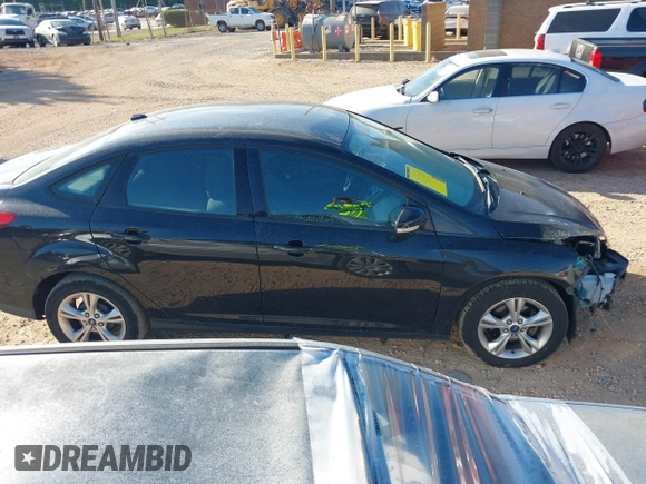2013 Ford Focus SE z VIN 1FADP3F2XDL311811, wystawiony jako IAAI lot #42127000 z przebiegiem 136 683 mil mil oraz . Historia ofert i sprzedaży dostępna na DreamBid. Obrazek 13.
