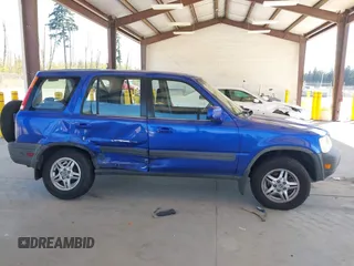 2001 Honda CR-V EX with VIN JHLRD18641C053166, listed as a IAAI auction lot 42078219 with 157,355 mi miles and . Bid and sale history available at DreamBid. Image 13.