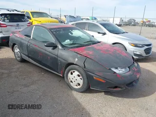 2002 Saturn SC with VIN 1G8ZR12782Z247790, listed as a IAAI auction lot 41813543 with Not Provided miles and . Bid and sale history available at DreamBid. Image 1.