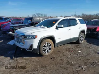 2020 GMC Acadia SLT with VIN 1GKKNMLS4LZ136098, listed as a IAAI auction lot 41618272 with 100,486 mi miles and . Bid and sale history available at DreamBid. Image 2.
