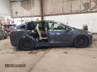 2016 Tesla Model X 70D with VIN 5YJXCBE2XGF025303, listed as a IAAI auction lot 41558869 with 77,793 mi miles and . Bid and sale history available at DreamBid. Image 14.