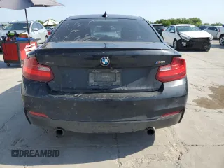 2016 BMW 2 Series M235i xDrive with VIN WBA1J9C55GV372098, listed as a Copart auction lot 58088723 with 84,995 mi miles. Bid and sale history available at carsss.com. Image 6.