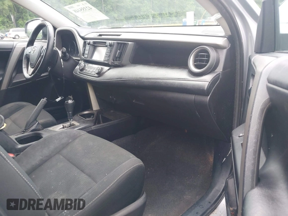 2018 Toyota RAV4 XLE with VIN 2T3WFREV4JW486939, listed as a IAAI auction lot 42355448 with 133,655 mi miles and . Bid and sale history available at DreamBid. Image 5.