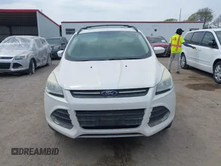 2014 Ford Escape SE with VIN 1FMCU9GX9EUB15944, listed as a IAAI auction lot 42110269 with 120,297 mi miles and . Bid and sale history available at DreamBid. Image 6.