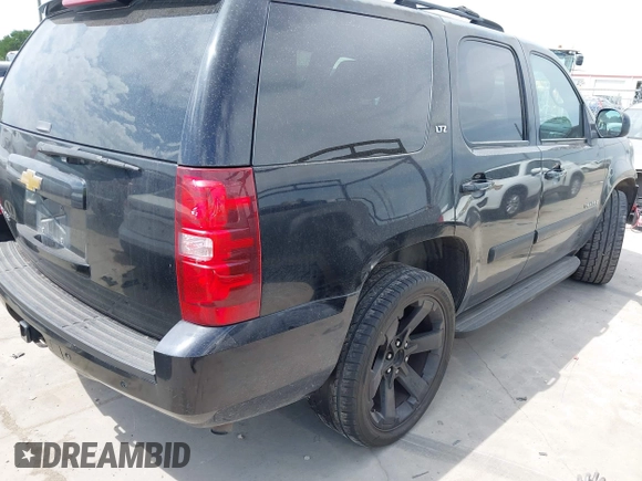 2007 Chevrolet Tahoe LT with VIN 1GNFC13087R188069, listed as a IAAI auction lot 42473664 with 195,237 mi miles and . Bid and sale history available at DreamBid. Image 4.