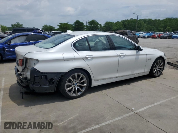 2014 BMW 5 Series 535d xDrive with VIN WBAFV3C57ED685132, listed as a Copart auction lot 60413005 with 94,355 mi miles and Salvage title. Bid and sale history available at DreamBid. Image 3.