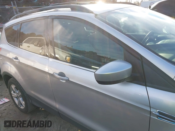 2014 Ford Escape SE with VIN 1FMCU9G96EUC53975, listed as a IAAI auction lot 41342661 with 128,594 mi miles. Bid and sale history available at carsss.com. Image 13.
