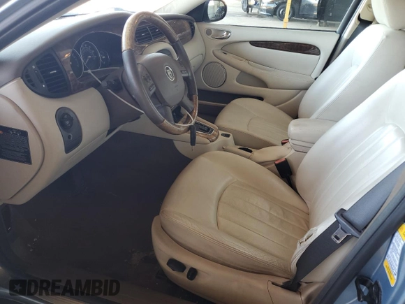 2004 Jaguar X-Type with VIN SAJEA51C14WE06627, listed as a Copart auction lot 54925735 with 107,756 mi miles and Clean Title. Bid and sale history available at DreamBid. Image 7.