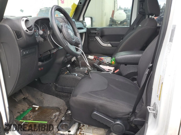 2015 Jeep Wrangler Unlimited Rubicon with VIN 1C4BJWFGXFL693566, listed as a Copart auction lot 46628765 with 70,128 mi miles and Salvage Title. Bid and sale history available at carsss.com. Image 7.