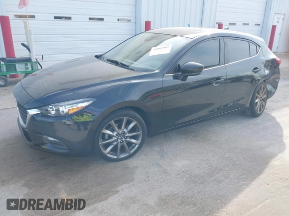 2018 Mazda 3 Touring with VIN 3MZBN1L30JM247097, listed as a IAAI auction lot 41803062 with 61,345 mi miles. Bid and sale history available at carsss.com. Image 17.