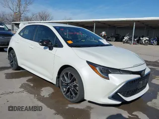 2019 Toyota Corolla Hatchback SE with VIN JTNK4RBEXK3059838, listed as a IAAI auction lot 41794822 with 139,199 mi miles. Bid and sale history available at carsss.com. Image 1.