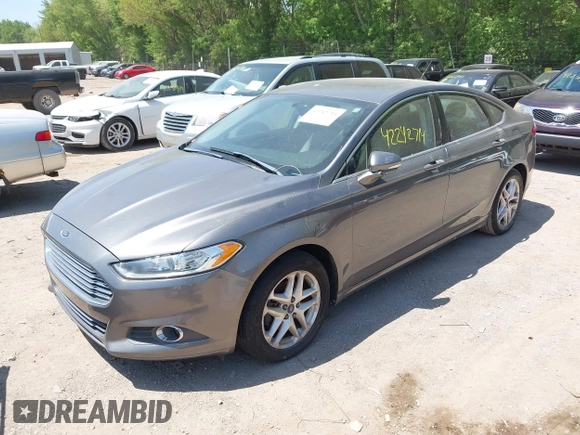 2014 Ford Fusion SE with VIN 3FA6P0HD7ER328428, listed as a IAAI auction lot 42242714 with 74,199 mi miles and . Bid and sale history available at DreamBid. Image 2.