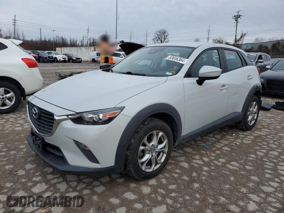 2018 Mazda CX-3 Sport z VIN JM1DKFB74J0318410, wystawiony jako Copart lot #83656364 z przebiegiem 87 853 mil mil oraz Szkoda całkowita • Salvage title. Historia ofert i sprzedaży dostępna na DreamBid. Obrazek 1.