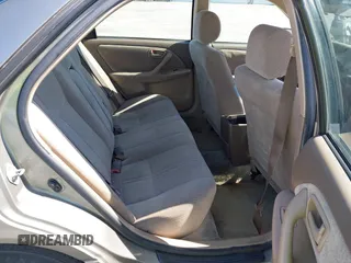 2000 Toyota Camry CE z VIN JT2BG22K4Y0394606, wystawiony jako IAAI lot #42342175 z przebiegiem 245 616 mil mil oraz . Historia ofert i sprzedaży dostępna na DreamBid. Obrazek 8.