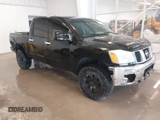 2007 Nissan Titan LE with VIN 1N6BA07B77N242856, listed as a IAAI auction lot 41496692 with 243,803 mi miles. Bid and sale history available at carsss.com. Image 1.