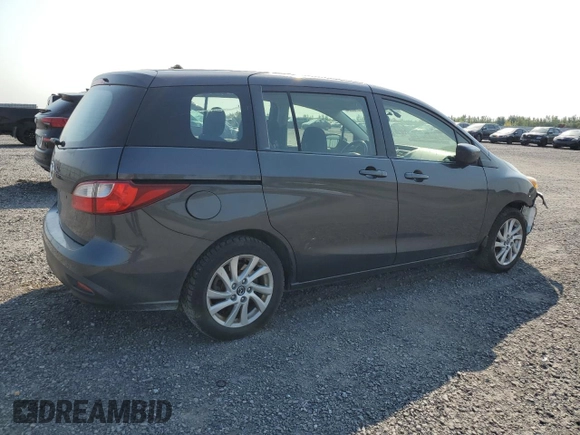 2013 Mazda 5 Touring with VIN JM1CW2CL5D0152715, listed as a Copart auction lot 71315534 with 219,315 mi miles and Salvage Title. Bid and sale history available at DreamBid. Image 3.