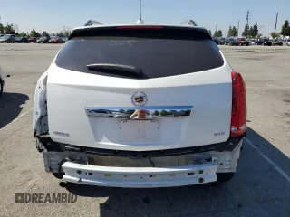 2015 Cadillac SRX Luxury Collection z VIN 3GYFNBE31FS634519, wystawiony jako Copart lot #57292645 z przebiegiem 93 777 mil mil oraz Szkody całkowita. Historia ofert i sprzedaży dostępna na DreamBid. Obrazek 6.