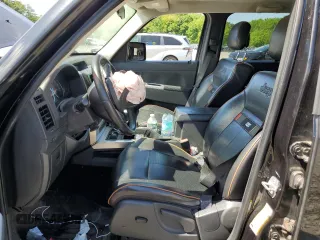 2011 Jeep Liberty Sport Jet z VIN 1J4PN2GK4BW558575, wystawiony jako Copart lot #55954565 z przebiegiem Nie podano mil oraz Szkoda całkowita • Salvage title. Historia ofert i sprzedaży dostępna na DreamBid. Obrazek 7.