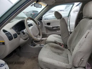2003 Hyundai Accent GL with VIN KMHCG35C23U264701, listed as a Copart auction lot 80029154 with 142,090 mi miles and Salvage Title. Bid and sale history available at carsss.com. Image 7.