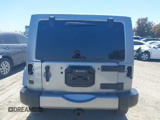 2018 Jeep Wrangler Unlimited Sport S with VIN 1C4HJWDG5JL839703, listed as a IAAI auction lot 42140205 with 61,604 mi miles and . Bid and sale history available at DreamBid. Image 17.