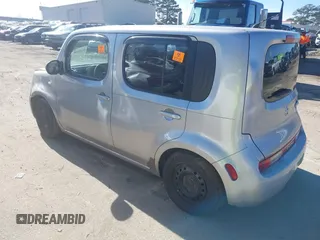 2009 Nissan Cube SL z VIN JN8AZ28RX9T126052, wystawiony jako IAAI lot #41446606 z przebiegiem 246 413 mil mil oraz . Historia ofert i sprzedaży dostępna na DreamBid. Obrazek 3.