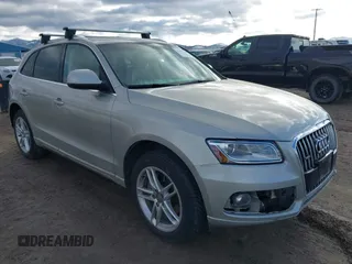 2014 Audi Q5 Premium Plus z VIN WA1CMAFP6EA063529, wystawiony jako IAAI lot #41705364 z przebiegiem 154 501 mil mil oraz . Historia ofert i sprzedaży dostępna na DreamBid. Obrazek 1.
