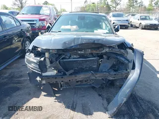 2015 Dodge Charger RT with VIN 2C3CDXCT4FH765494, listed as a IAAI auction lot 41683083 with 129,209 mi miles and . Bid and sale history available at DreamBid. Image 6.