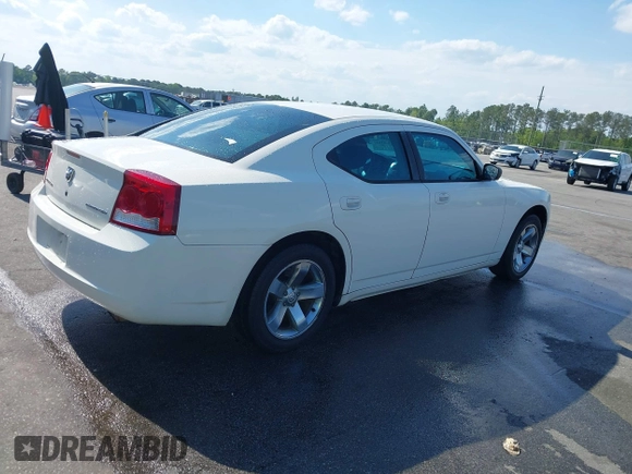 2009 Dodge Charger SE with VIN 2B3KA43V59H523089, listed as a IAAI auction lot 42002447 with 265,731 mi miles. Bid and sale history available at carsss.com. Image 4.