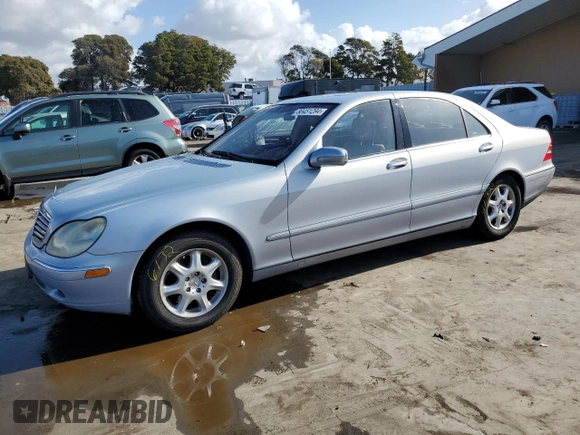 2002 Mercedes-Benz S-Class 4.3L with VIN WDBNG70J52A258559, listed as a Copart auction lot 80451294 with 283,626 mi miles and Salvage Title. Bid and sale history available at carsss.com. Image 1.