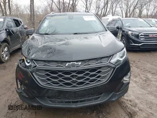 2021 Chevrolet Equinox Premier z VIN 2GNAXNEV4M6125086, wystawiony jako IAAI lot #41475387 z przebiegiem 53 387 mil mil oraz . Historia ofert i sprzedaży dostępna na DreamBid. Obrazek 12.