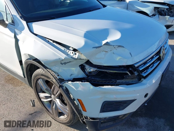 2018 Volkswagen Tiguan SEL Premium with VIN 3VV5B7AX2JM202908, listed as a IAAI auction lot 41137619 with 84,323 mi miles and . Bid and sale history available at DreamBid. Image 6.