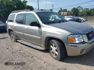 2003 GMC Envoy XL SLT with VIN 1GKES16S336101568, listed as a IAAI auction lot 40187998 with 185,402 mi miles. Bid and sale history available at carsss.com. Image 1.