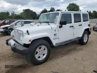2015 Jeep Wrangler Unlimited Sahara with VIN 1C4BJWEG1FL658920, listed as a Copart auction lot 58624345 with 161,169 mi miles and Salvage title. Bid and sale history available at DreamBid. Image 1.
