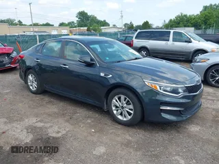 2016 Kia Optima LX z VIN 5XXGT4L37GG087200, wystawiony jako IAAI lot #42456982 z przebiegiem 86 910 mil mil oraz . Historia ofert i sprzedaży dostępna na DreamBid. Obrazek 1.